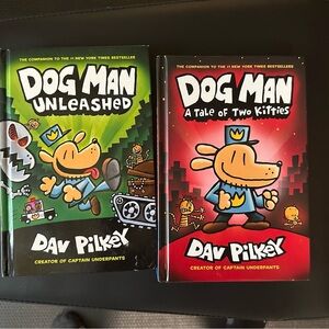 Two hardback DOG MAN books in good condition